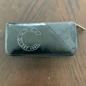 Coach black zip around wallet 8x4”